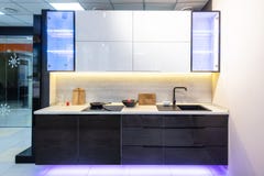 Kitchen cabinets with milled groove instead of classic handles stock photos Kitchen cabinets with milled groove instead of classic handles stock photos