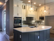 Kitchen with island counter design in a new house Stock Photography Kitchen with island counter design in a new house Stock Photography