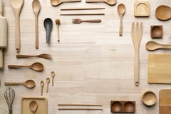 Kitchen utensils for cooking on the wooden table Stock Images Kitchen utensils for cooking on the wooden table Stock Images