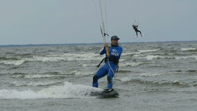 Kite surfer slow motion stock footage Kite surfer slow motion stock footage