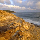 Kitt-Strand bei Sonnenuntergang, Nationalpark Bouddi, zentrale K?ste, NSW, Australien stockbild Kitt-Strand bei Sonnenuntergang, Nationalpark Bouddi, zentrale K?ste, NSW, Australien stockbild