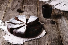 Kladdkaka. Traditional Swedish Moist Chocolate Cake On Old Rustic Wooden Table Royalty Free Stock Images