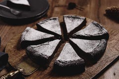 Kladdkaka. Traditional Swedish Moist Chocolate Cake On Wooden Table Royalty Free Stock Photo