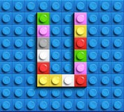 Kleurrijk brievenu van de bouw van legobakstenen op blauwe legoachtergrond Legobrief M stock illustratie Kleurrijk brievenu van de bouw van legobakstenen op blauwe legoachtergrond Legobrief M stock illustratie