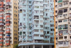 Kleurrijke, uiterst kleine stadsflats in Hong Kong stock afbeeldingen Kleurrijke, uiterst kleine stadsflats in Hong Kong stock afbeeldingen