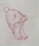 Knitted cap and socks Stock Image