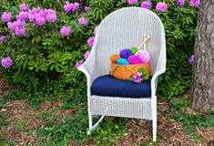 Knitting basket on rocking chair Royalty Free Stock Photography