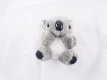 Koala, gray soft bear doll, toy and souvenir. Koala, gray soft bear doll lie down on the bed, toy and souvenir stock photos Koala, gray soft bear doll, toy and souvenir. Koala, gray soft bear doll lie down on the bed, toy and souvenir stock photos