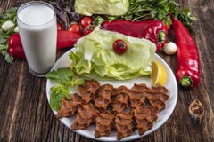 Kofte de clope, un plat de viande crue en cuisines turques et arméniennes E photos libres de droits Kofte de clope, un plat de viande crue en cuisines turques et arméniennes E photos libres de droits