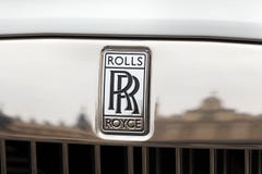 Rolls Royce logo on Rolls Royce car. Kraków, Poland - MARCH 21, 2019: Rolls Royce logo on Rolls Royce car. Rolls Royce is a British luxury automobile maker royalty free stock image Rolls Royce logo on Rolls Royce car. Kraków, Poland - MARCH 21, 2019: Rolls Royce logo on Rolls Royce car. Rolls Royce is a British luxury automobile maker royalty free stock image