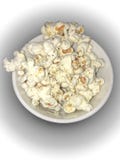 Kryddigt popcorn i bunke royaltyfri bild Kryddigt popcorn i bunke royaltyfri bild