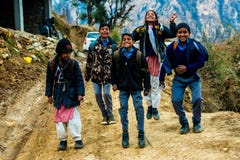 Kullu, Himachal Pradesh, India - March 01, 2019 : Photo of Himalayan kids jumping in Himalaya, Sainj Valley stock photos Kullu, Himachal Pradesh, India - March 01, 2019 : Photo of Himalayan kids jumping in Himalaya, Sainj Valley stock photos
