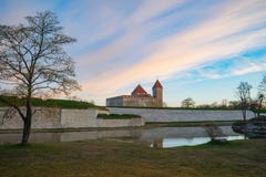 Kuressaare Episcopal Castle in morning dawn by springtime Royalty Free Stock Image Kuressaare Episcopal Castle in morning dawn by springtime Royalty Free Stock Image