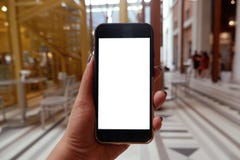 Kvinnas händer som rymmer den smarta telefonen med den tomma kopieringsutrymmeskärmen för ditt textmeddelande eller informationsi fotografering för bildbyråer Kvinnas händer som rymmer den smarta telefonen med den tomma kopieringsutrymmeskärmen för ditt textmeddelande eller informationsi fotografering för bildbyråer