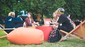 Kyiv, Ukraine - 07.09.2019: Atlas Weekend music festival outdoors, first day. Millennials are relaxin at music festival royalty free stock photography Kyiv, Ukraine - 07.09.2019: Atlas Weekend music festival outdoors, first day. Millennials are relaxin at music festival royalty free stock photography
