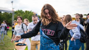Kyiv, Ukraine - 07.09.2019: Atlas Weekend music festival outdoors, first day. Millennials are relaxin at music festival stock image Kyiv, Ukraine - 07.09.2019: Atlas Weekend music festival outdoors, first day. Millennials are relaxin at music festival stock image
