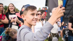 Kyiv, Ukraine - 07.09.2019: Atlas Weekend music festival outdoors, first day. Millennials are relaxin at music festival royalty free stock photos Kyiv, Ukraine - 07.09.2019: Atlas Weekend music festival outdoors, first day. Millennials are relaxin at music festival royalty free stock photos