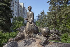 KYIV, UKRAINE - May 9, 2018: a monument to the fairy-tale hero Kotigoroshko in embroidery, which was pressed by the mace of Snake royalty free stock images KYIV, UKRAINE - May 9, 2018: a monument to the fairy-tale hero Kotigoroshko in embroidery, which was pressed by the mace of Snake royalty free stock images