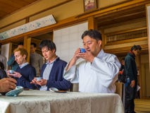 KYOTO, JAPAN - JULY 05, 2017: Unidentified people at table in a meeting reunion, drinking tea, in Kyoto Stock Image KYOTO, JAPAN - JULY 05, 2017: Unidentified people at table in a meeting reunion, drinking tea, in Kyoto Stock Image