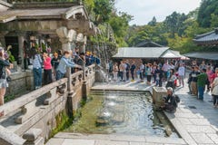KYOTO, JAPAN - OCTOBER 09, 2015: People Waiting For Water In Kiyomizu-dera Shrine Temple Alson Know As Pure Water Temple. Stock Image