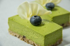 Käsekuchen des grünen Tees lizenzfreie stockfotografie Käsekuchen des grünen Tees lizenzfreie stockfotografie