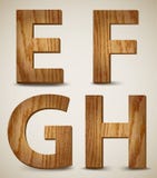 L'alphabet en bois grunge marque avec des lettres E, F, G, H. Vector illustration stock L'alphabet en bois grunge marque avec des lettres E, F, G, H. Vector illustration stock