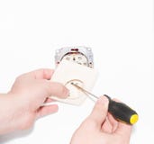 L'incavo nelle mani di un elettricista fotografie stock L'incavo nelle mani di un elettricista fotografie stock