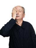 L'uomo anziano soffre dall'emicrania fotografia stock libera da diritti L'uomo anziano soffre dall'emicrania fotografia stock libera da diritti