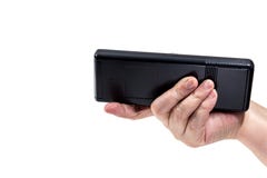 L'éloigné de la TV dans la main d'une femme agée photo libre de droits L'éloigné de la TV dans la main d'une femme agée photo libre de droits