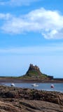 L'île sainte de Lindisfarne au nord-est de l'Angleterre images libres de droits L'île sainte de Lindisfarne au nord-est de l'Angleterre images libres de droits