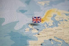 La bandiera del Regno Unito, Regno Unito nella mappa di mondo immagini stock libere da diritti La bandiera del Regno Unito, Regno Unito nella mappa di mondo immagini stock libere da diritti