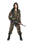 La bella ragazza con un'arma automatica immagine stock La bella ragazza con un'arma automatica immagine stock