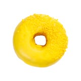 La ciambella con la glassa gialla e spruzza fotografie stock La ciambella con la glassa gialla e spruzza fotografie stock