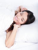 La donna addormentata sveglia di mattina fotografie stock La donna addormentata sveglia di mattina fotografie stock