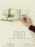 La main de la femme dessinant le croquis architectural de la maison images libres de droits La main de la femme dessinant le croquis architectural de la maison images libres de droits