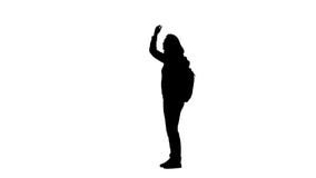 La muchacha agita su mano a sus amigos y los llama a ella Silueta Fondo blanco Vista lateral metrajes La muchacha agita su mano a sus amigos y los llama a ella Silueta Fondo blanco Vista lateral metrajes