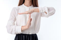 La muchacha en la camisa blanca ha puesto su mano encima de otro primer imagen de archivo La muchacha en la camisa blanca ha puesto su mano encima de otro primer imagen de archivo