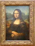 La pintura de Mona Lisa de Leonardo Da Vinci en el Louvre imagen de archivo La pintura de Mona Lisa de Leonardo Da Vinci en el Louvre imagen de archivo