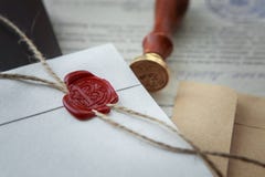 La pluma y el sello públicos del ` s del notario en el testamento y el último lo van a hacer Herramientas del notario público imagen de archivo La pluma y el sello públicos del ` s del notario en el testamento y el último lo van a hacer Herramientas del notario público imagen de archivo