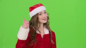 La ragazza della neve mostra il thrumb su Priorità bassa di Bokeh Schermo verde Fine in su Movimento lento archivi video La ragazza della neve mostra il thrumb su Priorità bassa di Bokeh Schermo verde Fine in su Movimento lento archivi video