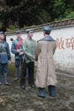 La statue des cadres révolutionnaires et des villageois pour se serrer la main dans le ¼ Œshenzhen, porcelaine de Parkï d'armée r images libres de droits La statue des cadres révolutionnaires et des villageois pour se serrer la main dans le ¼ Œshenzhen, porcelaine de Parkï d'armée r images libres de droits