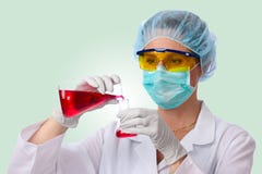 Lab Technician With Larger And Smaller Flask Royalty Free Stock Photography