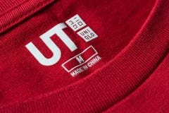 Label tag on Uniqlo shirt editorial photography. Image of center - 90170262