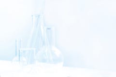 Laboratory Glassware In Light Blue Colors And White Background Stock Image Laboratory Glassware In Light Blue Colors And White Background Stock Image