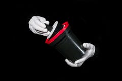 Laboratory, hands in white gloves hold a black and film, darkroom, developmen Royalty Free Stock Photography Laboratory, hands in white gloves hold a black and film, darkroom, developmen Royalty Free Stock Photography