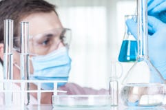 Laboratory scientist working at lab with test tubes stock photos Laboratory scientist working at lab with test tubes stock photos
