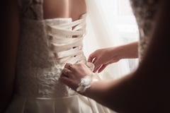 Lace-up wedding dress. White dress of the bride. royalty free stock photo Lace-up wedding dress. White dress of the bride. royalty free stock photo