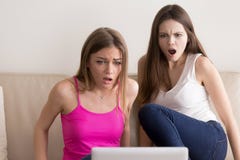Ladies surprised with shocking movie plot twist stock image Ladies surprised with shocking movie plot twist stock image