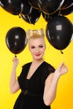 lady with black balloons