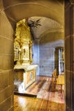 Laguardia, Alava, Spain. March 30, 2018: View Of A Side Chapel Of The Church Of San Juan With A Golden Altarpiece And An Entrance Royalty Free Stock Images Laguardia, Alava, Spain. March 30, 2018: View Of A Side Chapel Of The Church Of San Juan With A Golden Altarpiece And An Entrance Royalty Free Stock Images